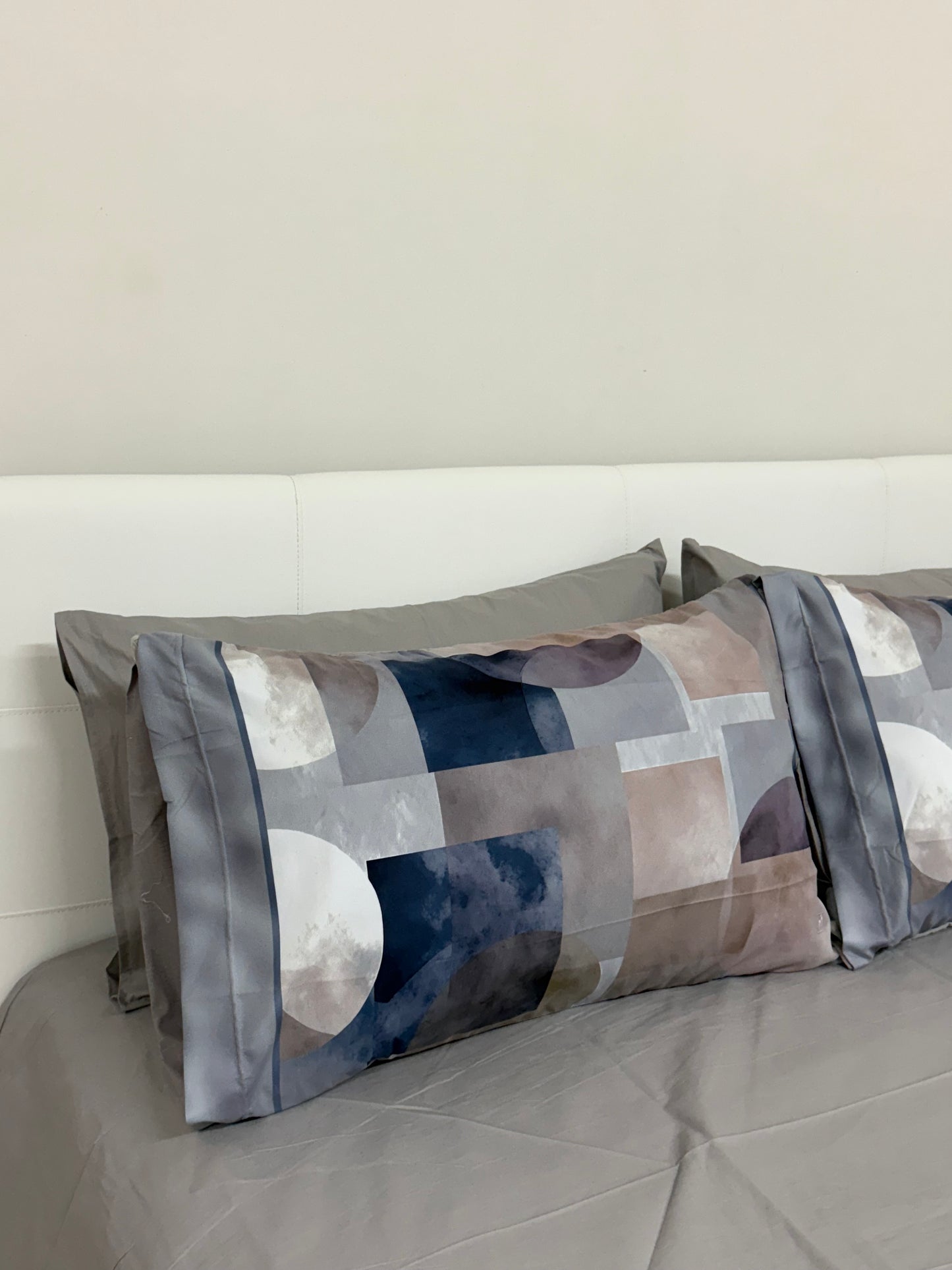 Lenzuola con 4 federe geometrie